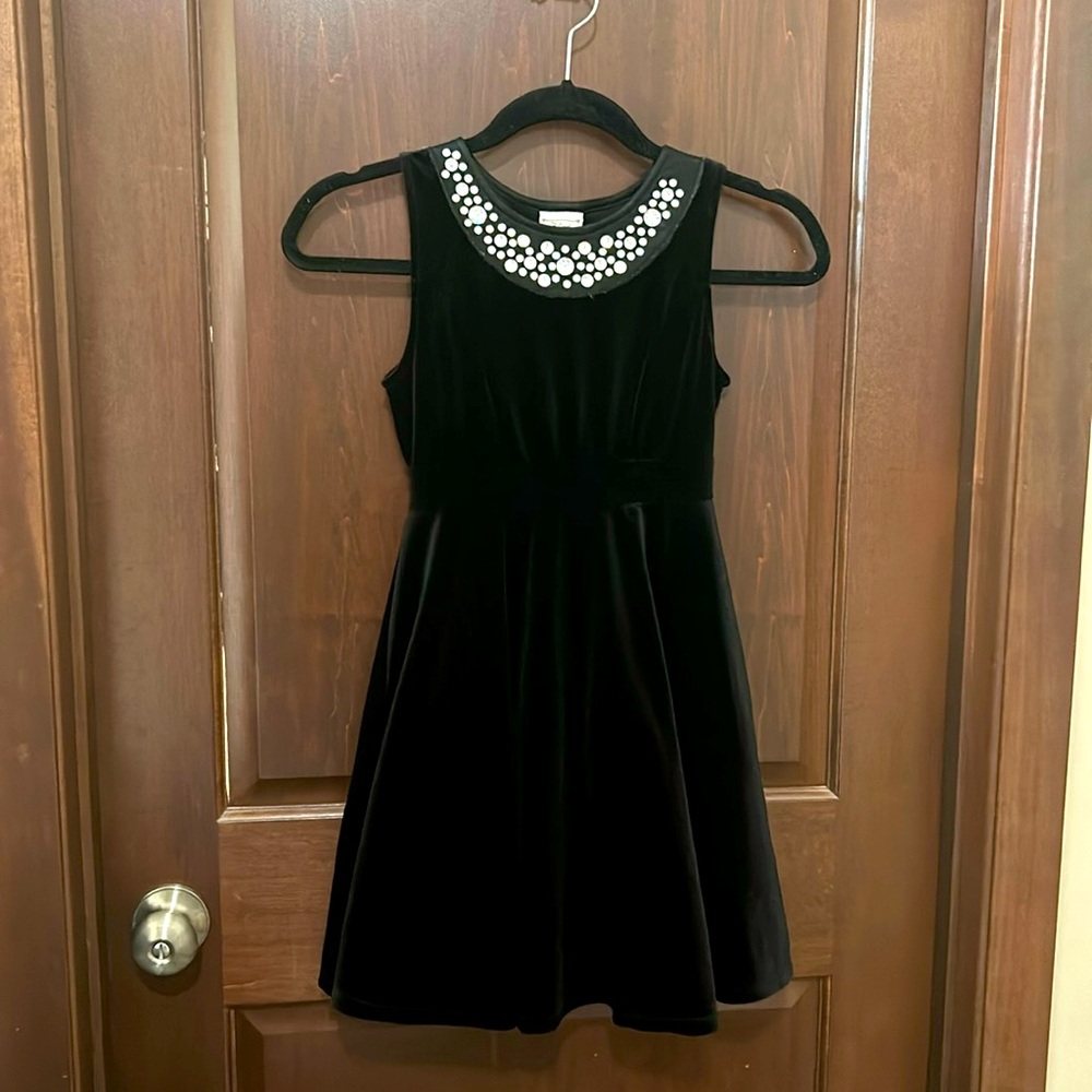D-signed black dress with jeweled collar